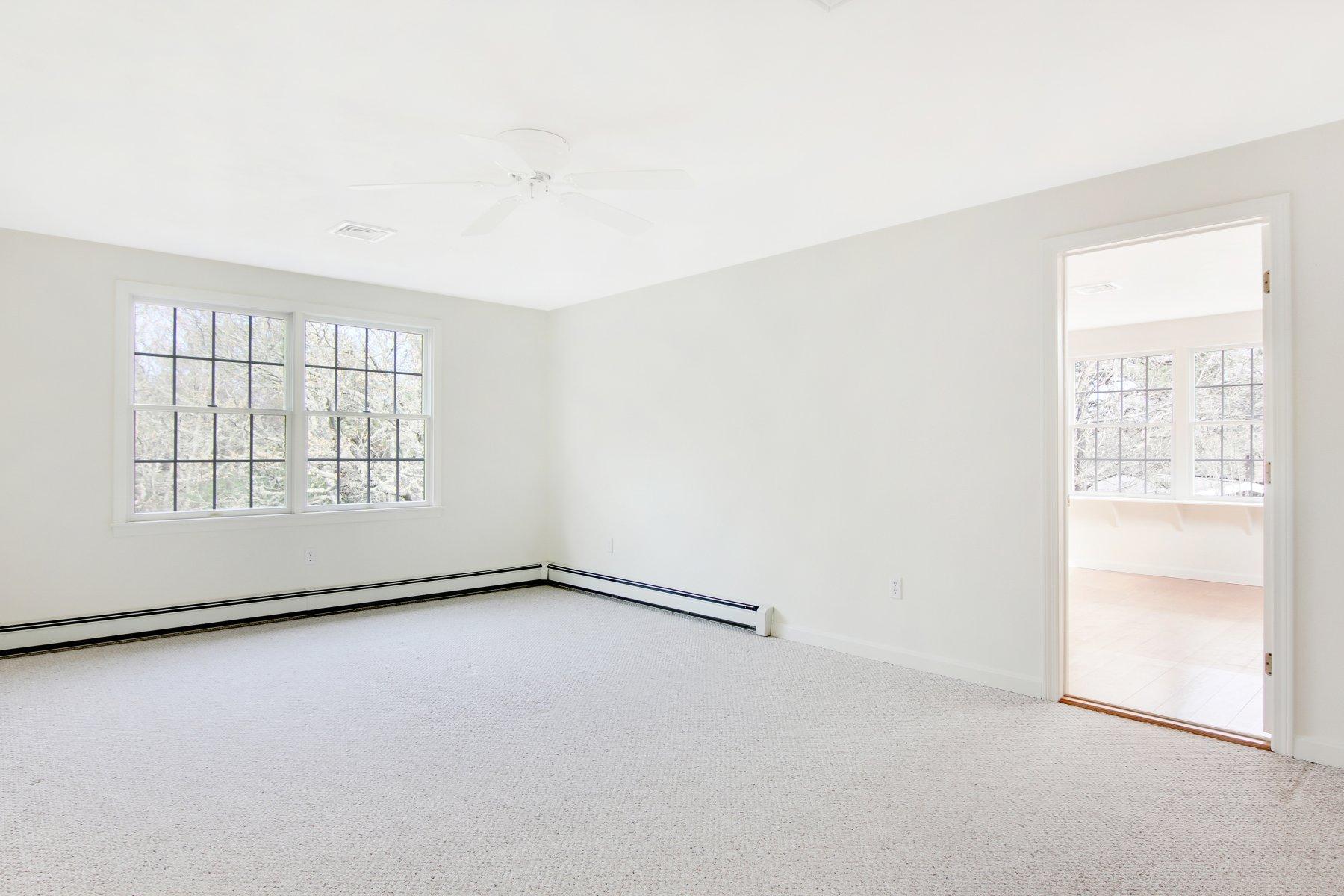230 Chippingstone Road Chatham, MA 02633 - Photo 32 of 38 an empty room with windows