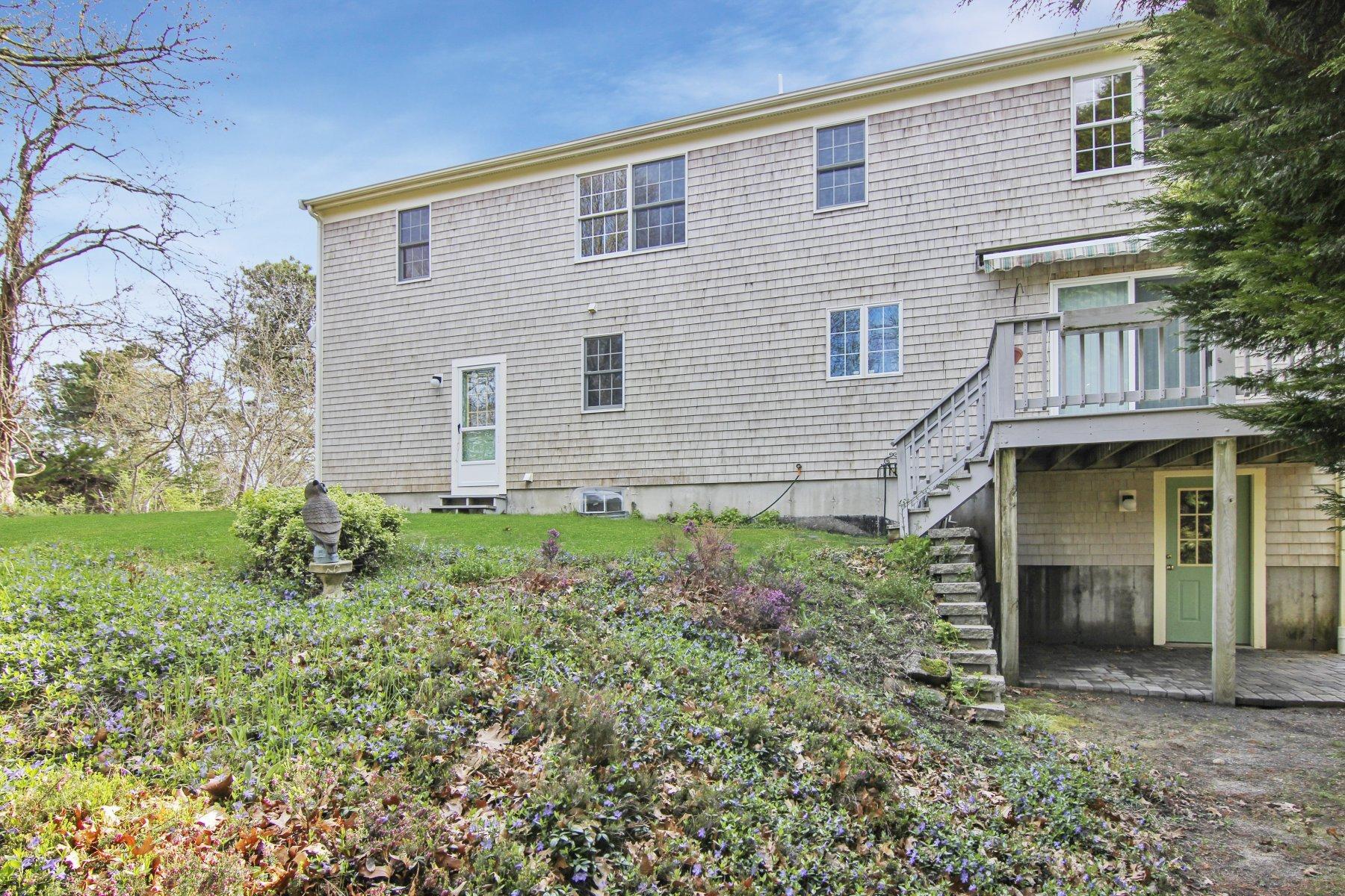 230 Chippingstone Road Chatham, MA 02633 - Photo 8 of 38 a front view of a house with garden