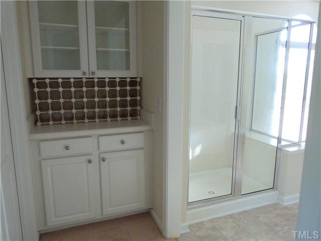 7500 Lagrange Drive Raleigh, NC 27613 - Photo 16 of 20 a view of walk in closet with empty racks