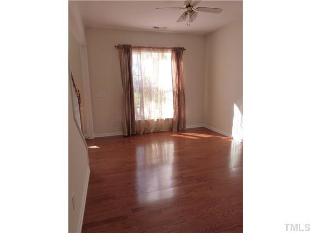 7500 Lagrange Drive Raleigh, NC 27613 - Photo 6 of 20 a view of a livingroom with wooden floor