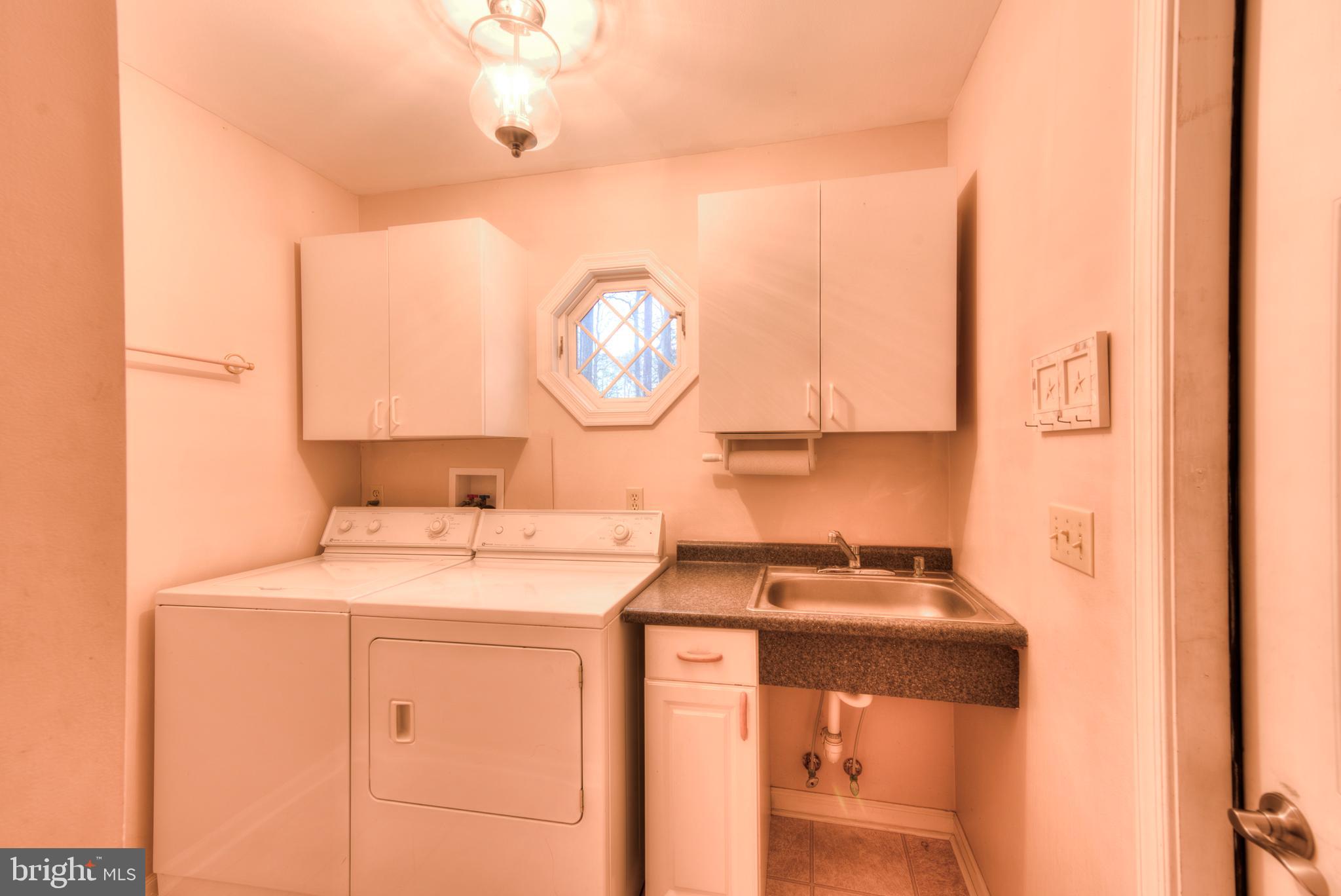 9 Wolfpit Court Rehoboth Beach, DE 19971 - Photo 30 of 31 Laundry/utility rm off garage