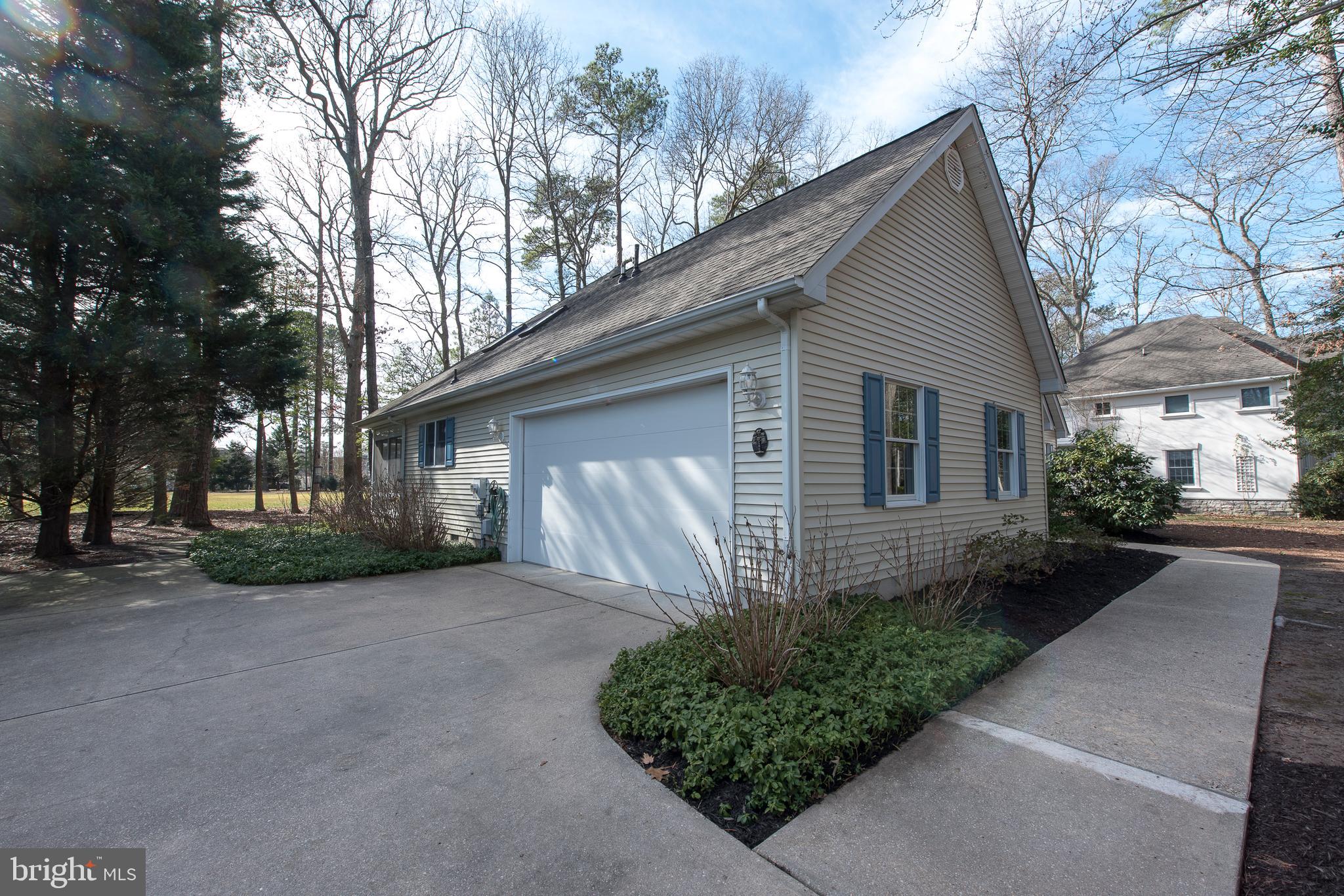 9 Wolfpit Court Rehoboth Beach, DE 19971 - Photo 6 of 31 2 car side entry garage + long driveway
