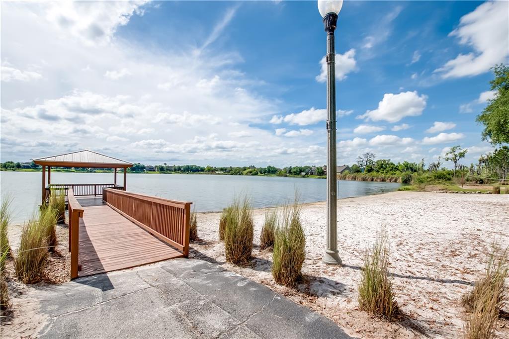 4655 Indian Deer Road Windermere, FL 34786 - Photo 24 of 25 Pier with fishing dock in a beach-like setting all within your community!