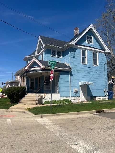 804 North 4th Street DeKalb, IL 60115 - Photo 2 of 4 a front view of a house with a yard
