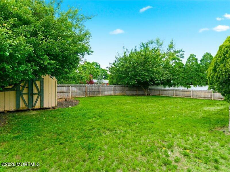 822 York Road Brick, NJ 08724 - Photo 32 of 37 a view of yard with grass and trees