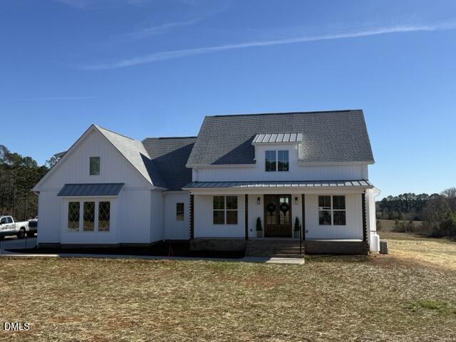 8 Trey Point Dr Spring Spring Hope, NC 27882 - Photo 28 of 31 a front view of a house with a garden