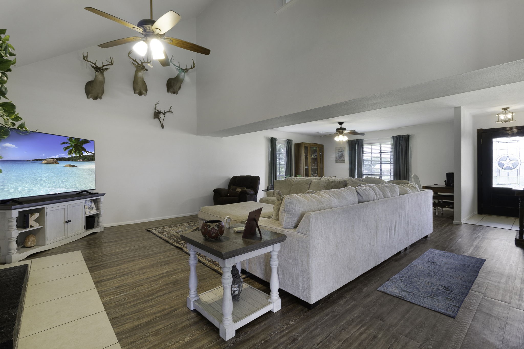 8043 Bell Lane Midway, TX 75852 - Photo 14 of 40 a living room with furniture and a chandelier