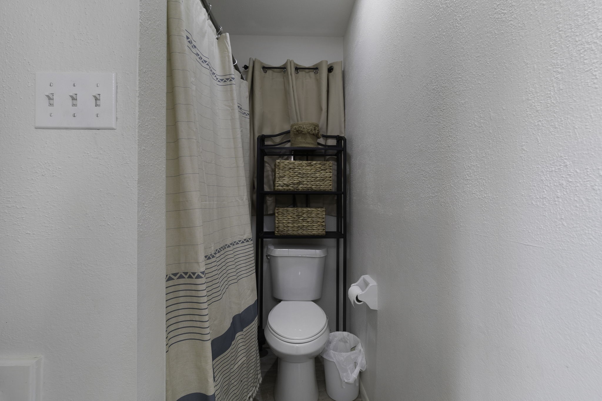 8043 Bell Lane Midway, TX 75852 - Photo 20 of 40 a bathroom with a toilet and a shower