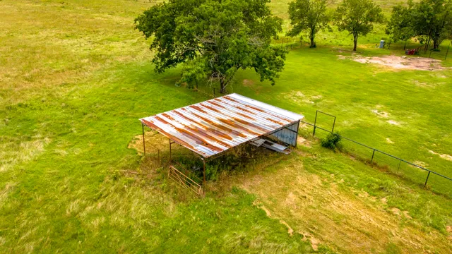 a view of a yard with an outdoor space