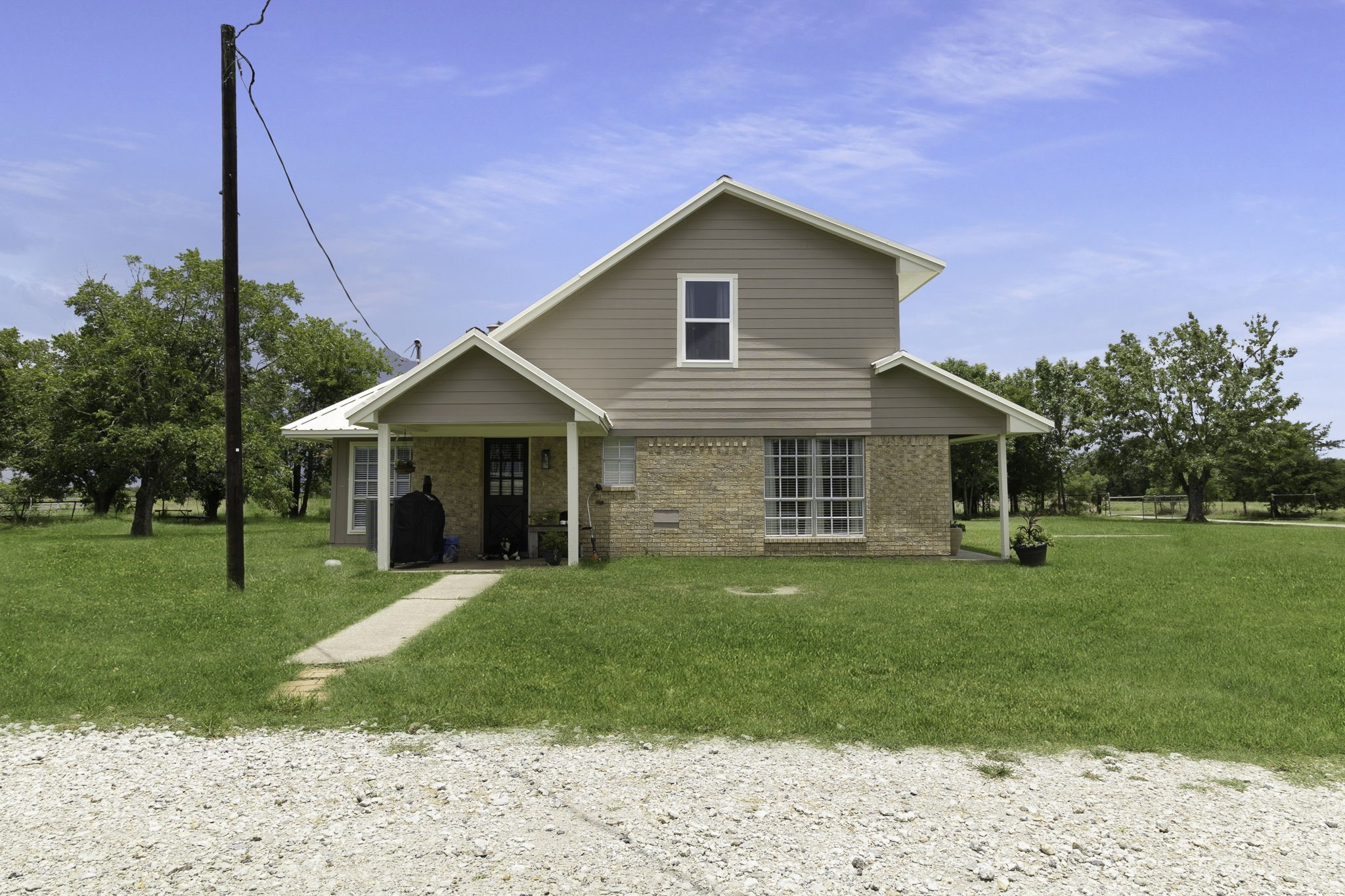 8043 Bell Lane Midway, TX 75852 - Photo 4 of 40 a view of a house with a yard
