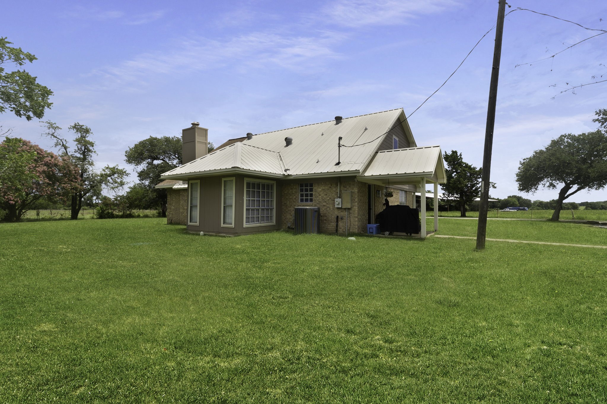 8043 Bell Lane Midway, TX 75852 - Photo 5 of 40 a front view of a house with a yard