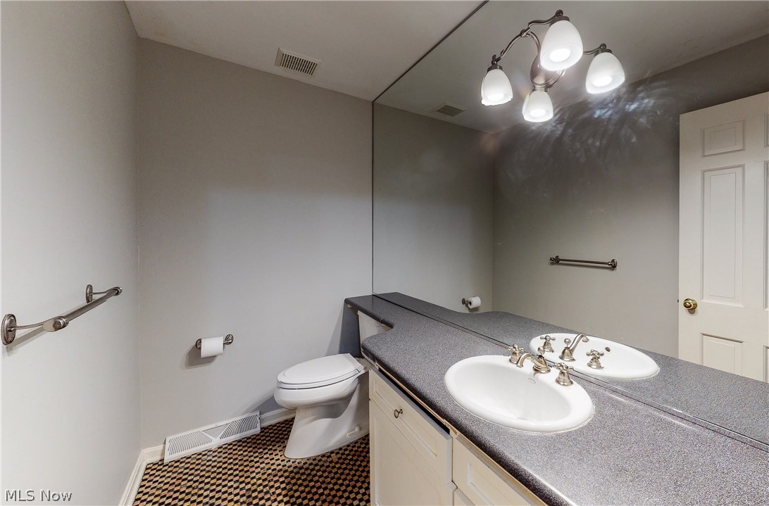 29550 Bolingbrook Road Pepper Pike, OH 44124 - Photo 4 of 24 First floor guest powder room.