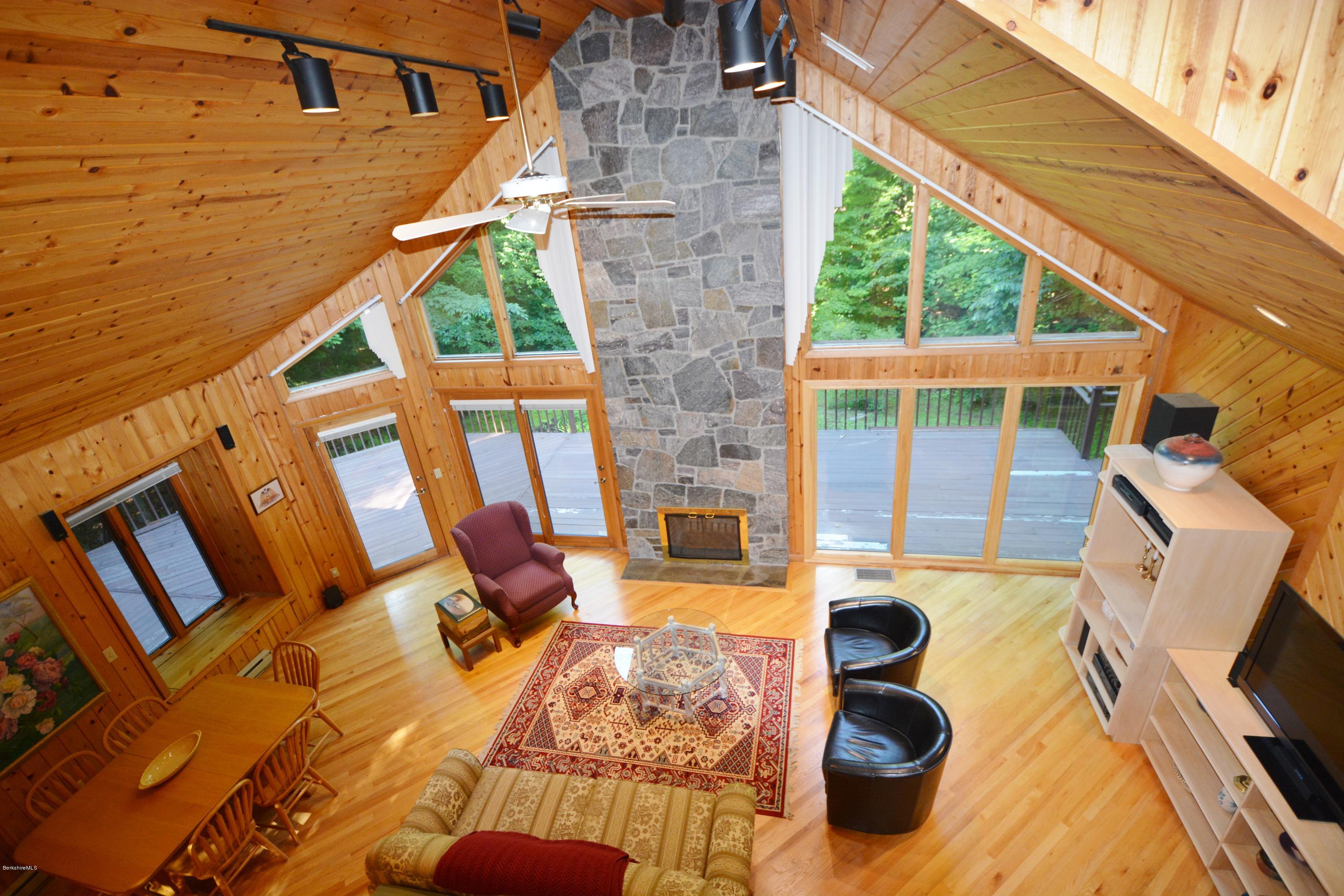 531 Moberg Road Becket, MA 01223 - Photo 14 of 25 a view of deck with patio