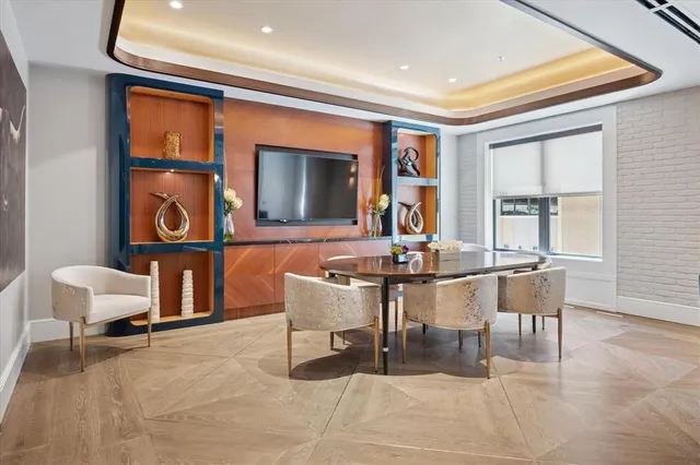 a view of a livingroom with furniture and window