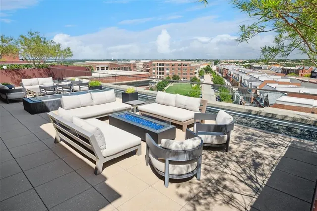 a view of a terrace with furniture