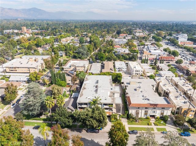 an aerial view of a city with lots of residential buildings