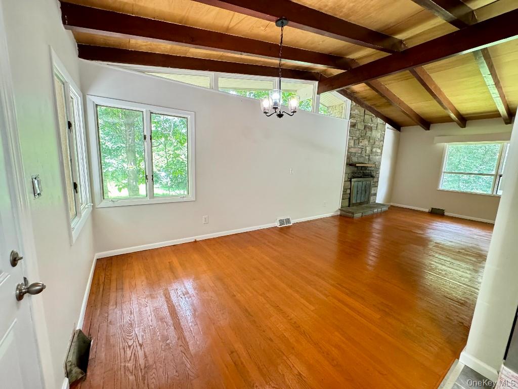 170 Leber Road Blauvelt, NY 10913 - Photo 8 of 15 a view of an empty room with a window and wooden floor