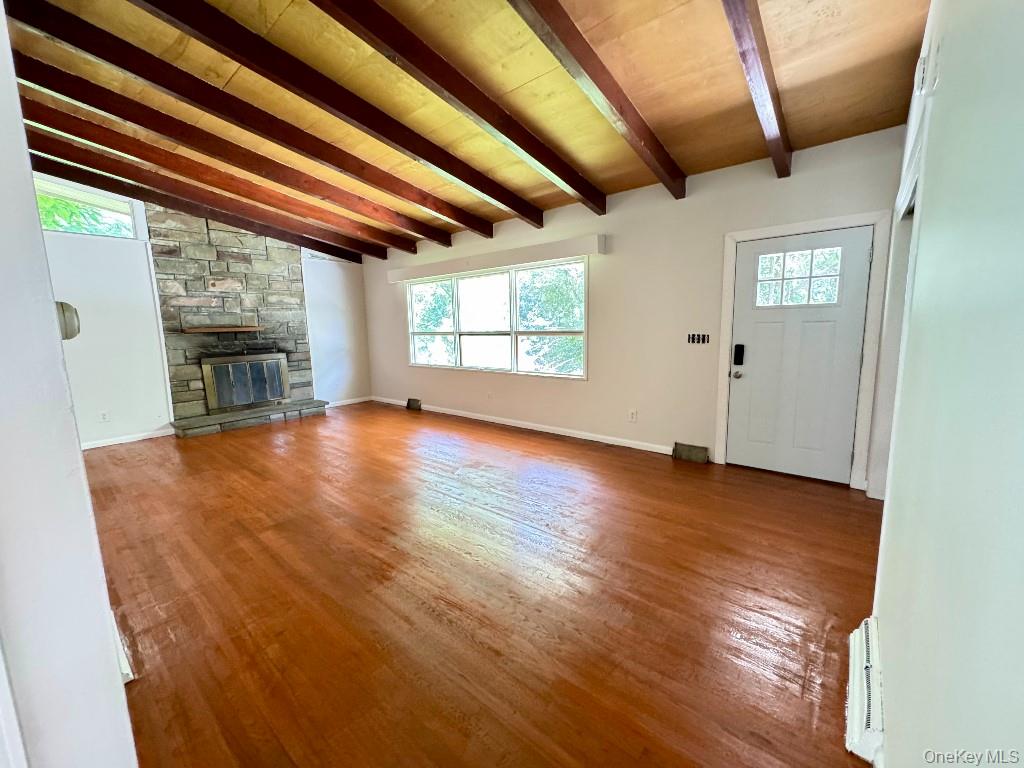 170 Leber Road Blauvelt, NY 10913 - Photo 9 of 15 a view of an empty room with wooden floor and a window