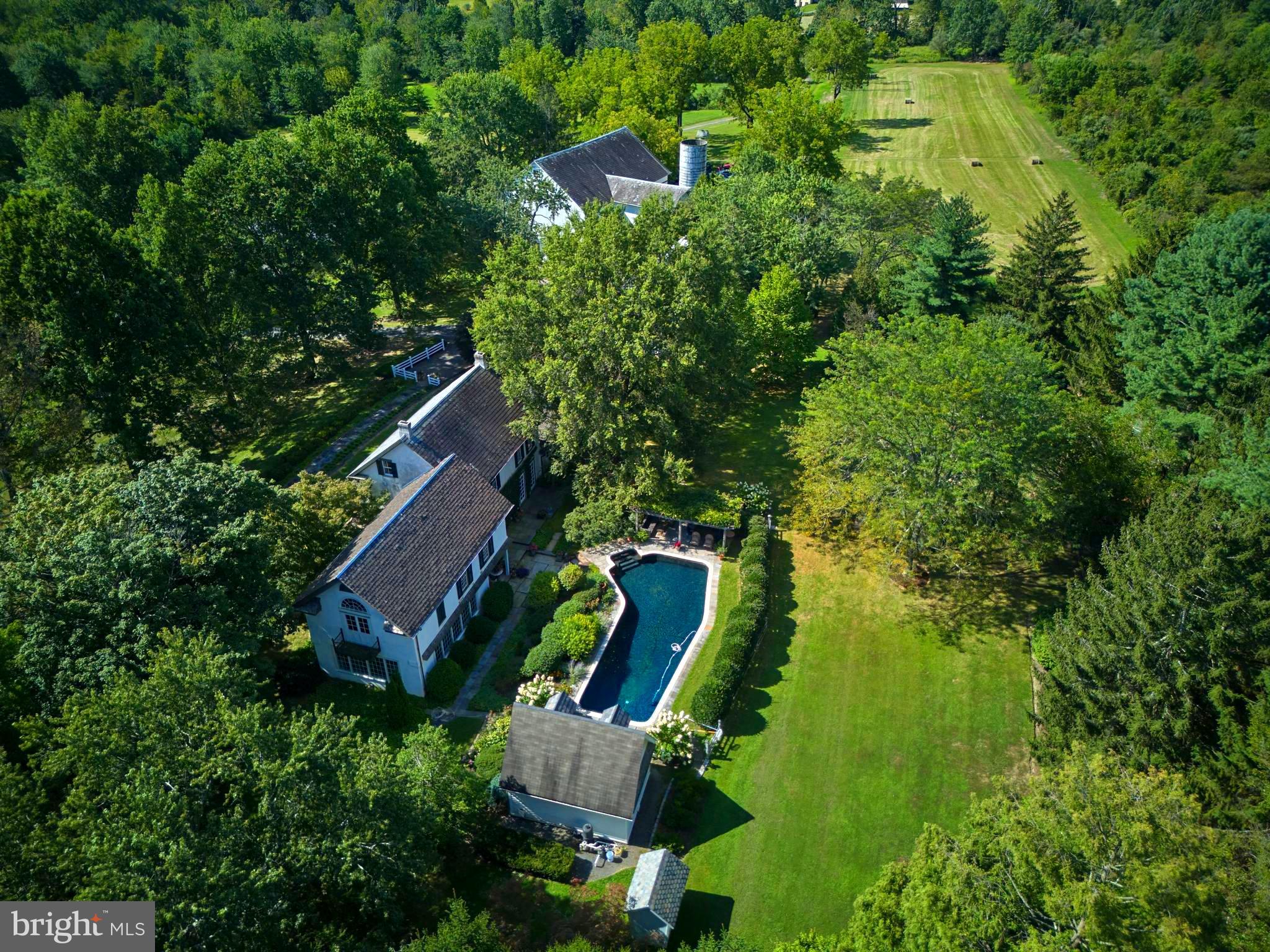5382 Wismer Road Pipersville, PA 18947 - Photo 65 of 67 an aerial view of house with yard swimming pool and outdoor seating