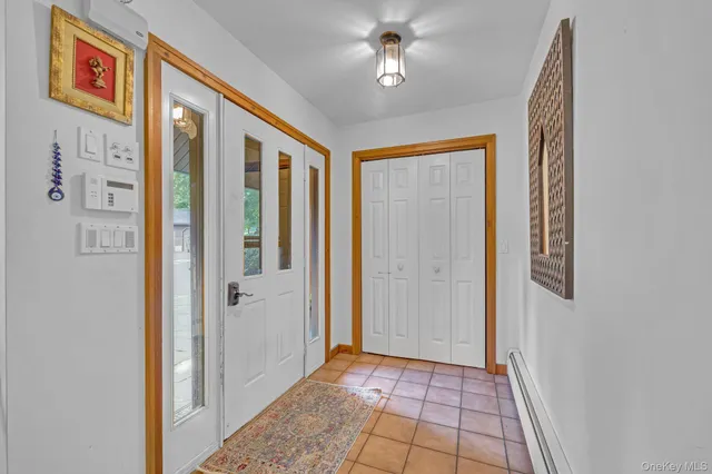 a view of a hallway with entryway