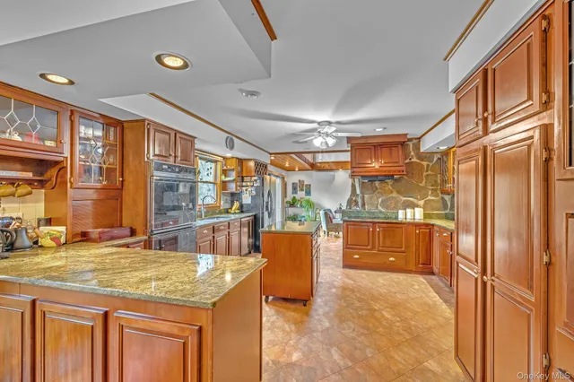 a kitchen with a table and chairs in it