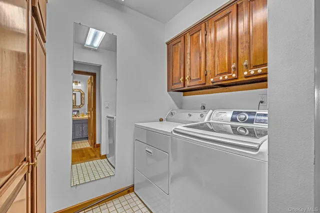 a bathroom with a sink and a window