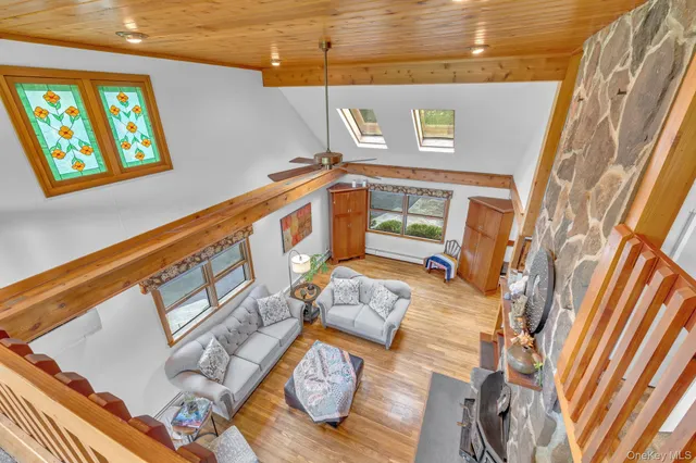 a living room with furniture and a rug