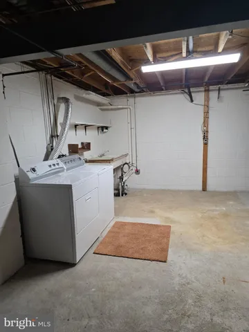 a utility room with cabinets