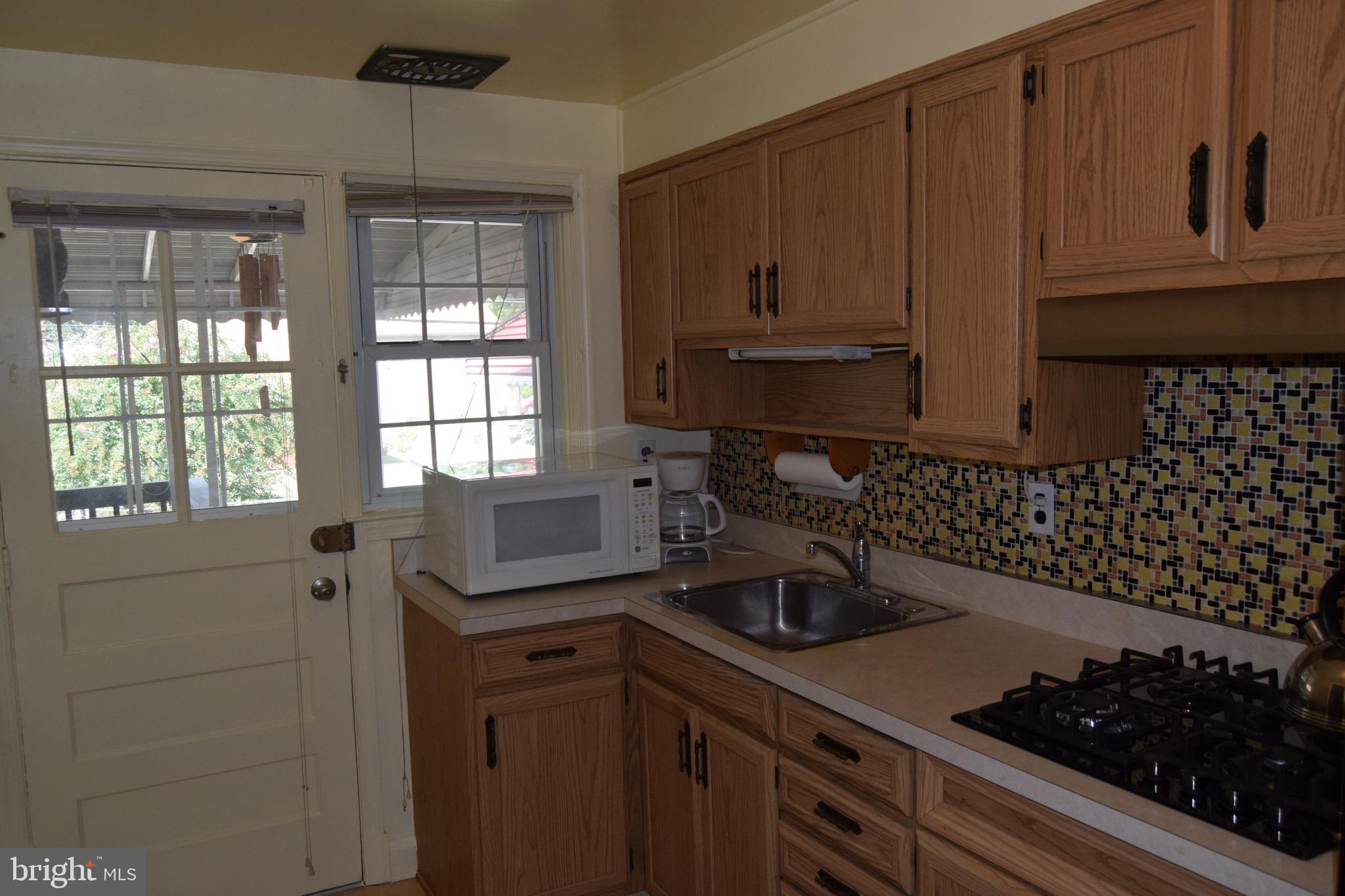 1432 Barrett Road Baltimore, MD 21207 - Photo 8 of 20 Access to large rear covered deck!