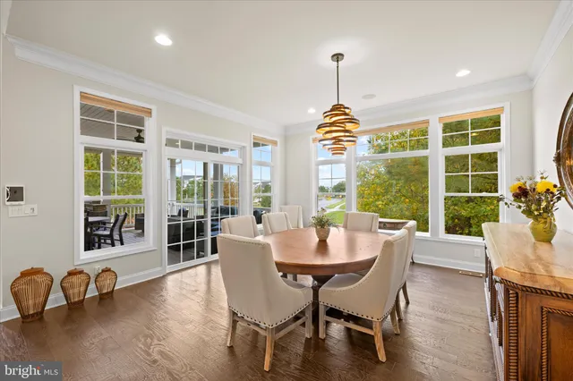 a view of an entryway with wooden floor