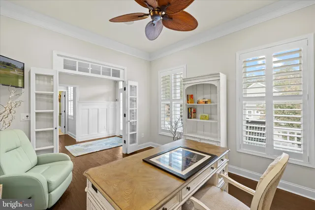 an aerial view of a golf course with parking space