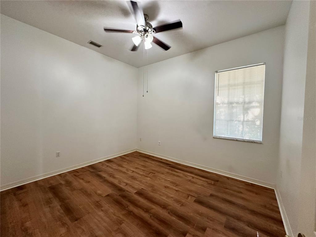 5261 Waterwood Drive Bartow, FL 33830 - Photo 33 of 72 an empty room with a window and a fan