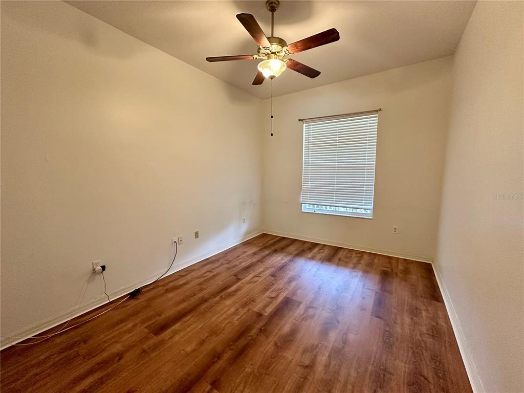 5261 Waterwood Drive Bartow, FL 33830 - Photo 34 of 72 wooden floor in an empty room with a window