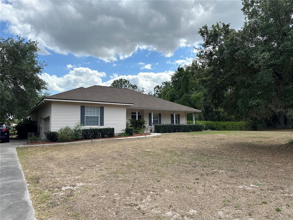 5261 Waterwood Drive Bartow, FL 33830 - Photo 7 of 72 a view of a house with a yard