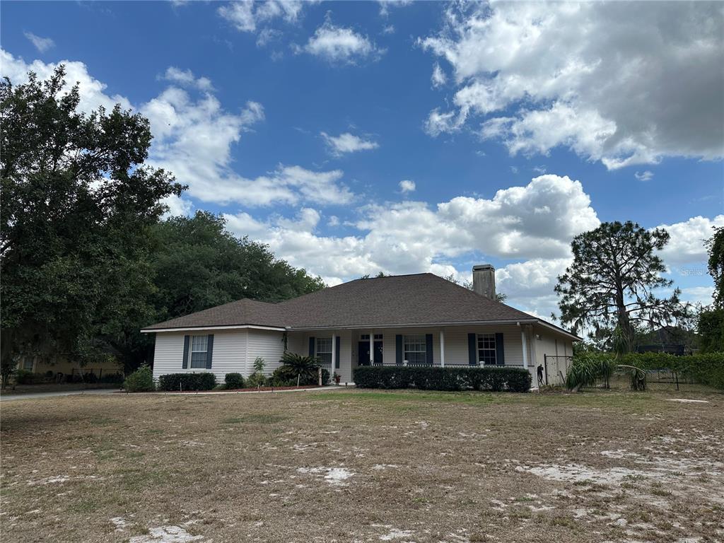 5261 Waterwood Drive Bartow, FL 33830 - Photo 72 of 72 a front view of a house with garden