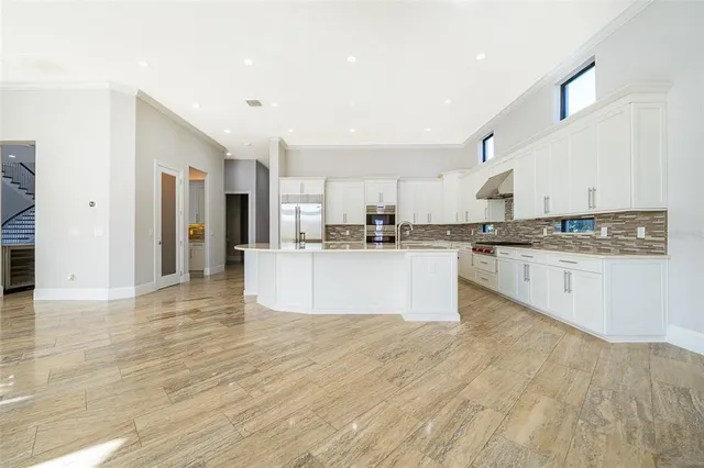 a view of a living room kitchen and living room