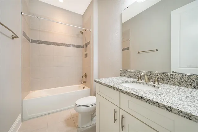 a view of a swimming pool with a lounge chairs