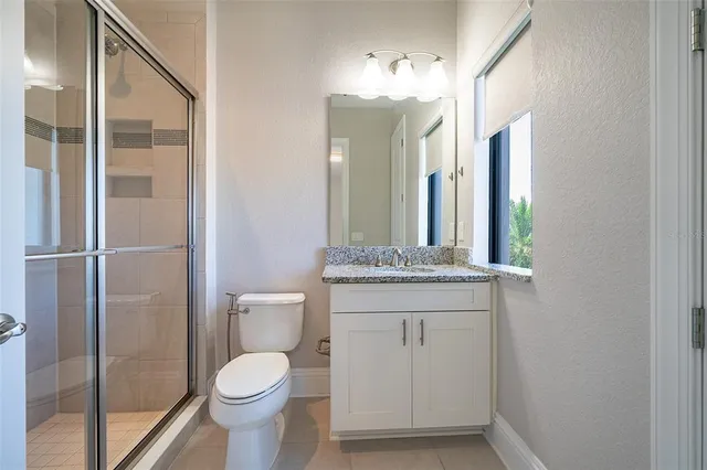 a very nice looking house with a large window