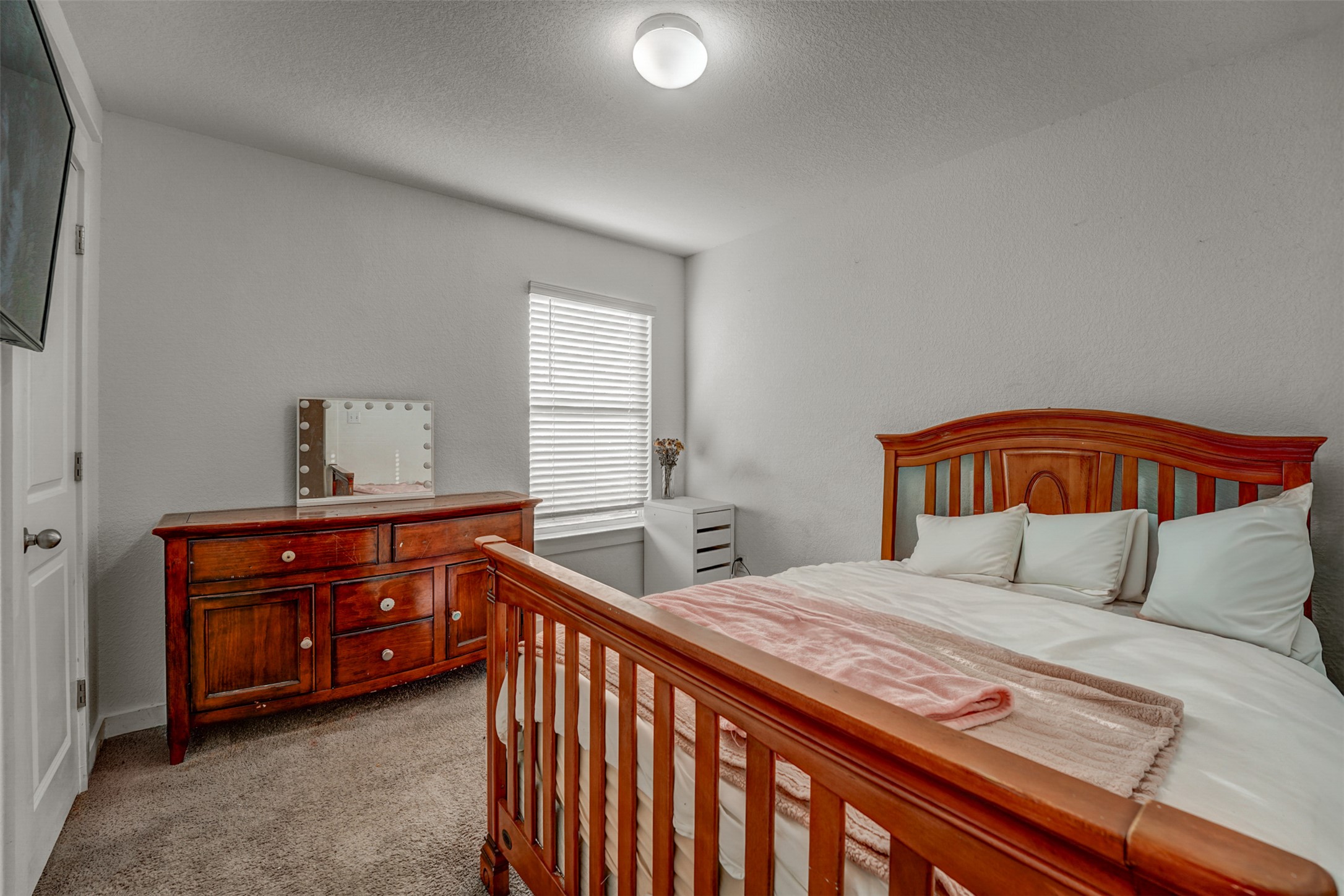 5806 Aviano Road Round Rock, TX 78665 - Photo 27 of 29 Well-lit bedroom features ample natural light and a spacious layout.