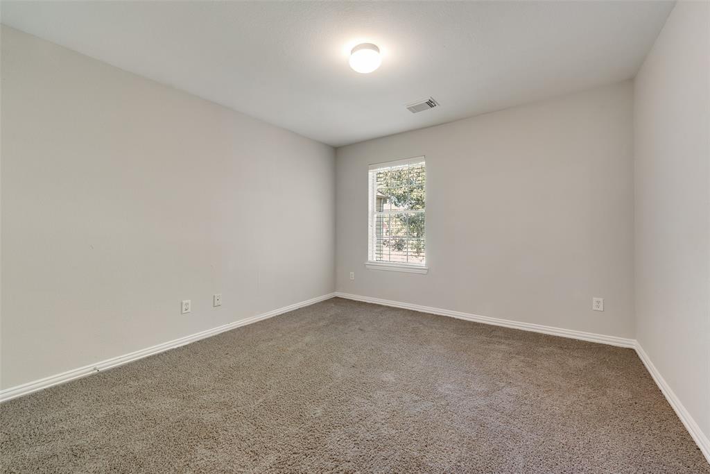 2716 Raspberry Court Plano, TX 75074 - Photo 13 of 20 Empty room featuring carpet floors