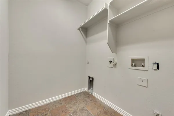 a view of small space with racks on the wall