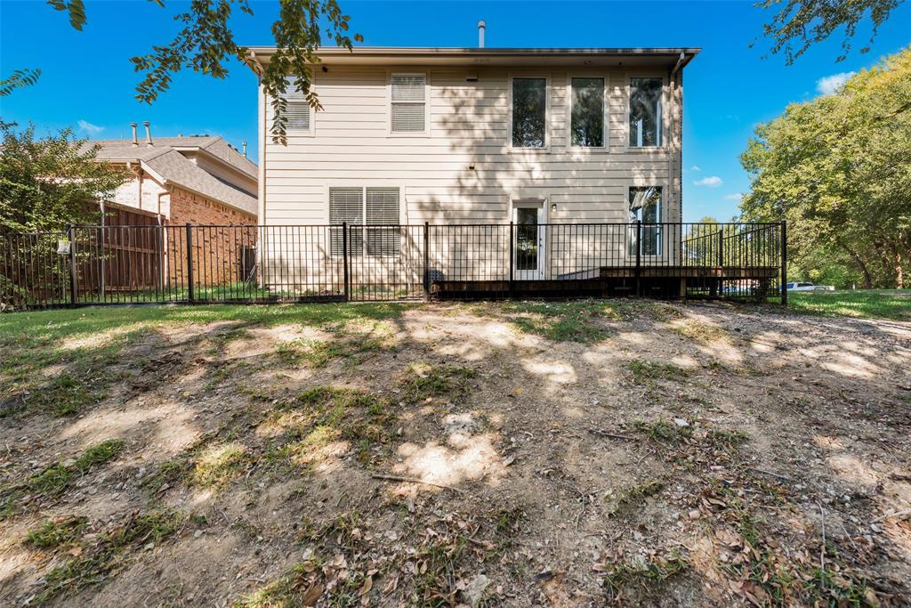2716 Raspberry Court Plano, TX 75074 - Photo 20 of 20 Back of property with a deck