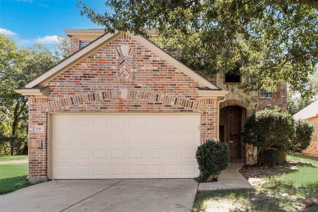 2716 Raspberry Court Plano, TX 75074 - Photo 2 of 20 View of front of property featuring a garage