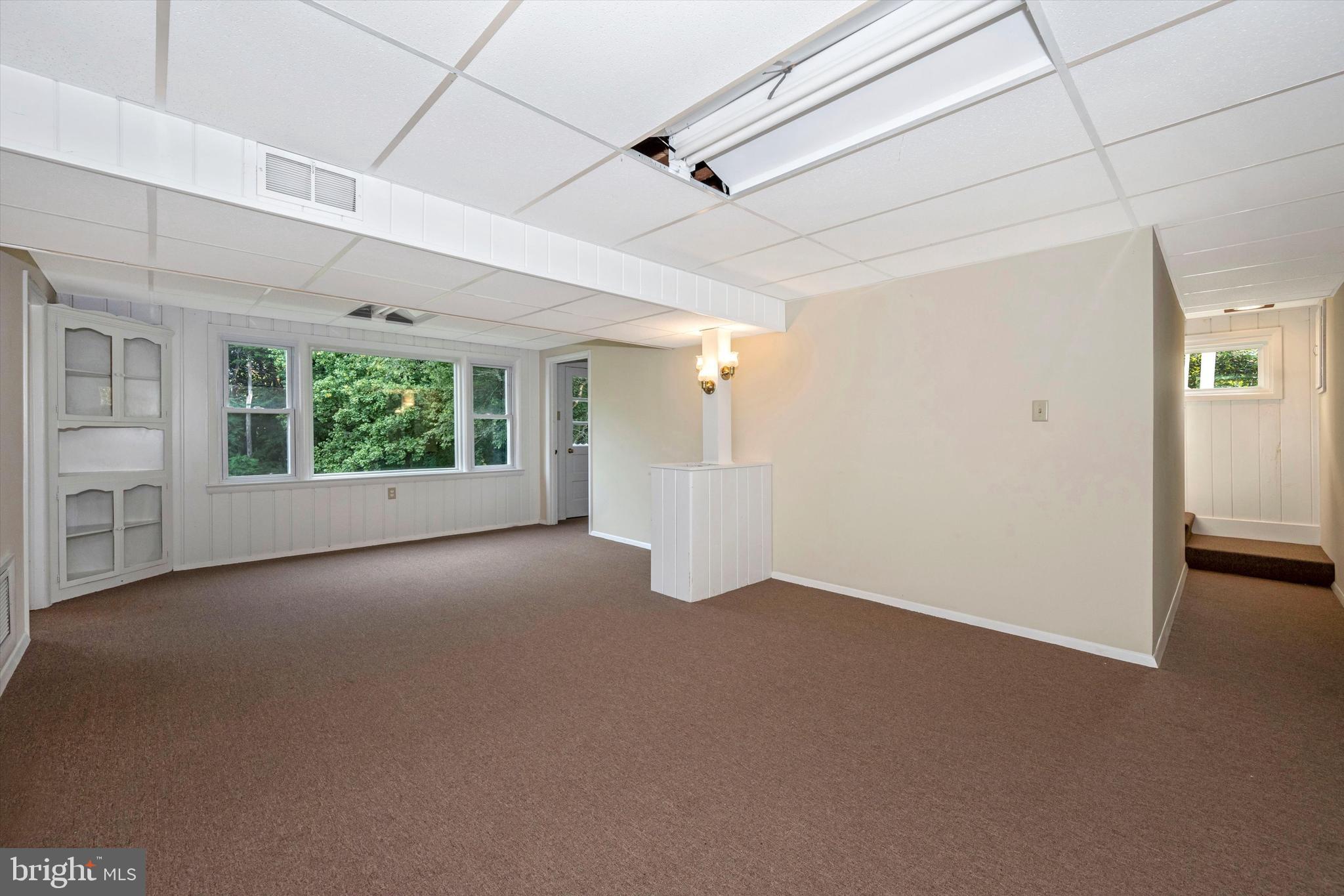 13530 Penn Shop Road Mount Airy, MD 21771 - Photo 23 of 31 Lower Family Room with Door to Backyard