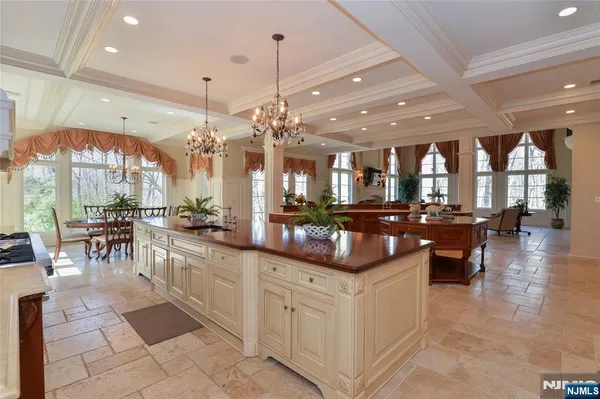 a view of a lobby with furniture and a large mirror