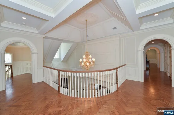 a view of a hallway view with staircase