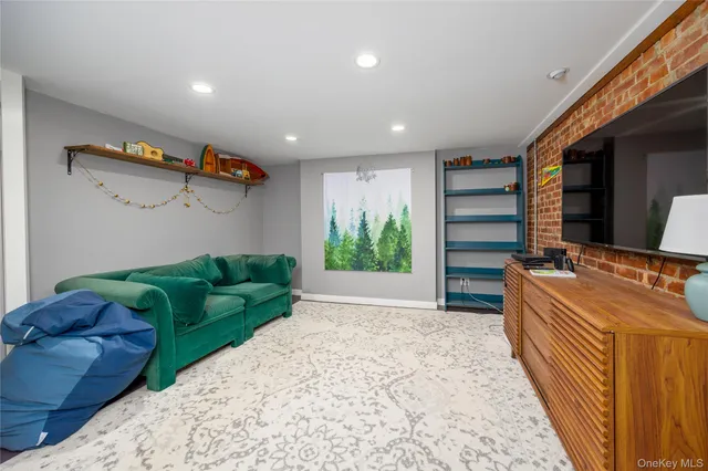 a livingroom with furniture and a window