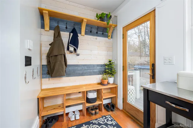 a view of living room filled with furniture and window