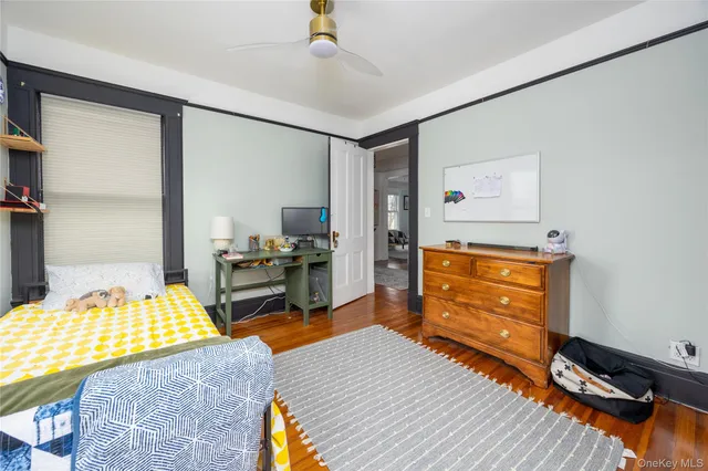 a room with a bed and furniture