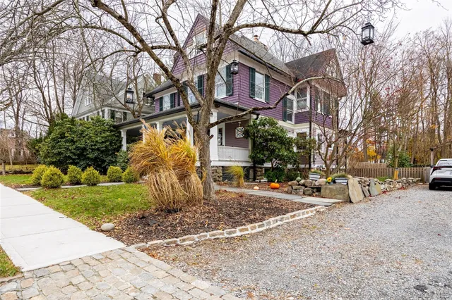 a view of a parked cars in front of a building